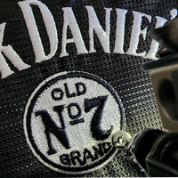 Golf bag with multiple embroidered logos and custom text